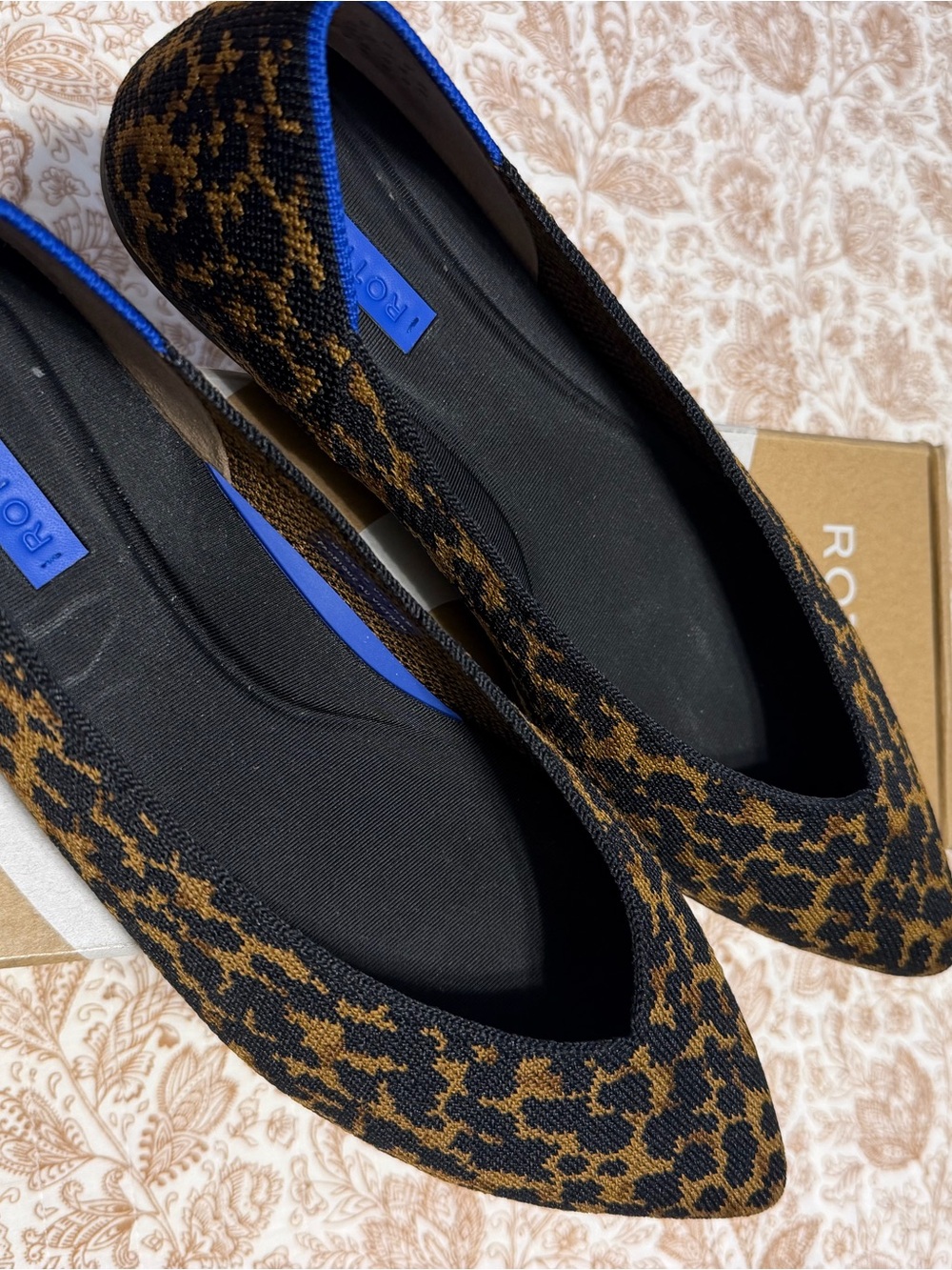 Rothy's Leopard-Pattern Pointed Flats in Black, Brown with Blue Trim